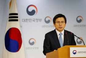 After impeachment, South Korea prime minister urges calm, vigilance 